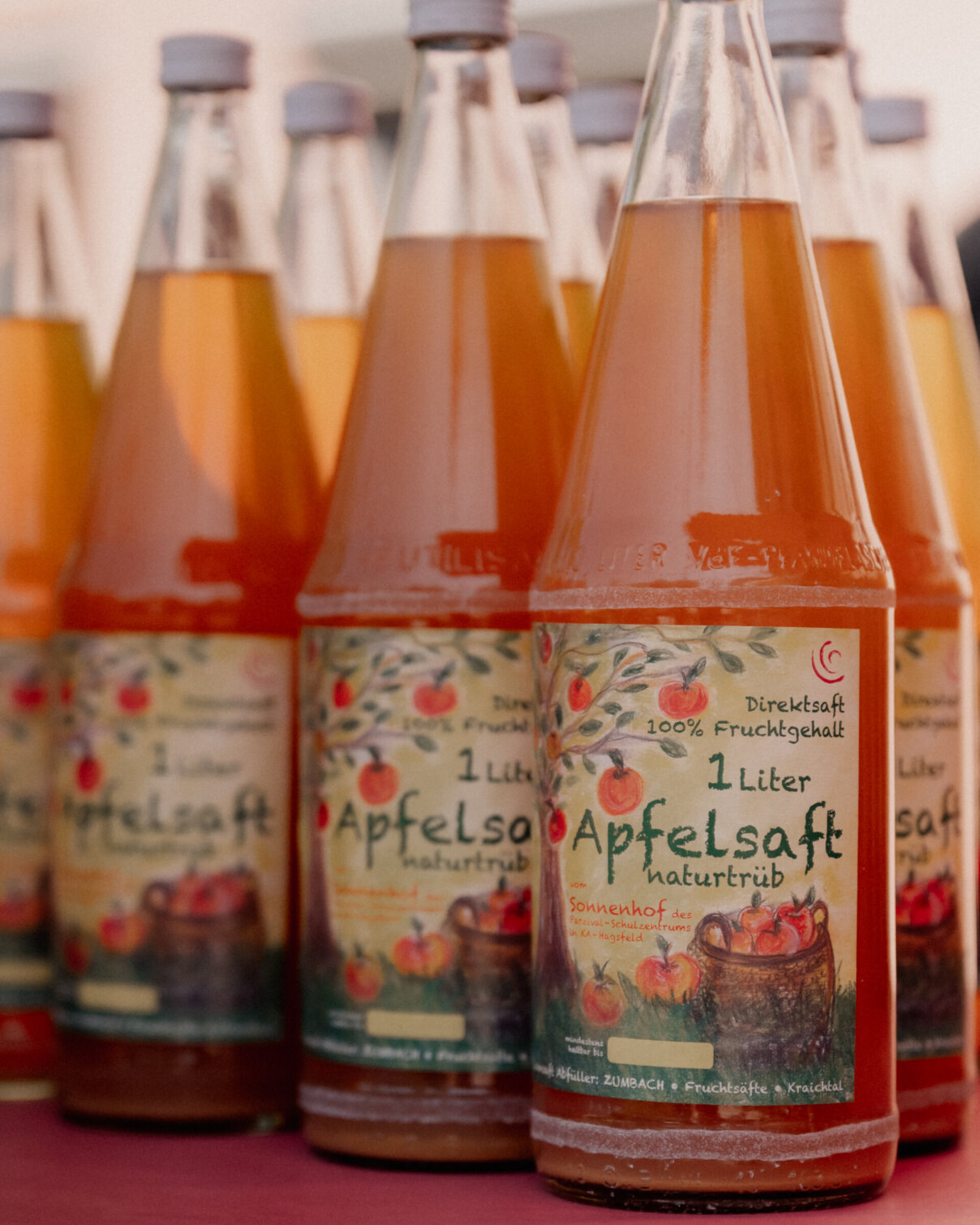Apfelsaft-Flaschen-parzival-zentrum-karlsruhe